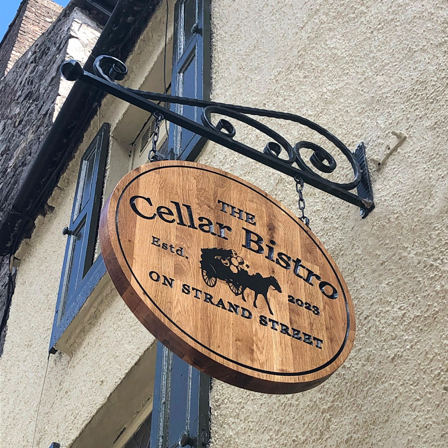 rustic wooden hanging sign